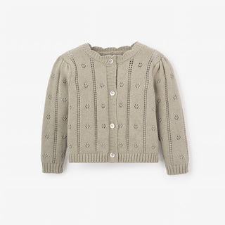 Knitted cardigan with button details on a white background