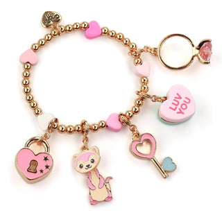 Colorful charm bracelet with various charms on a white background