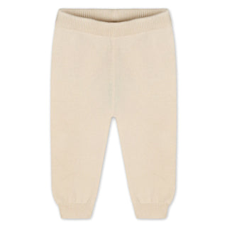 Beige baby pants on a white background