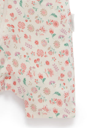 Floral patterned fabric with small flowers on a white background