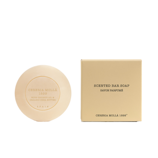 Bar of soap and its packaging with 'Cereria Molla 1899' branding on a white background