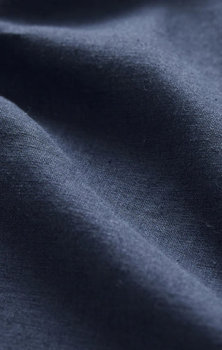 Close-up of dark blue fabric with visible texture