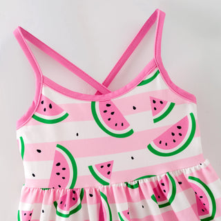 Pink children's dress with watermelon pattern on a white background