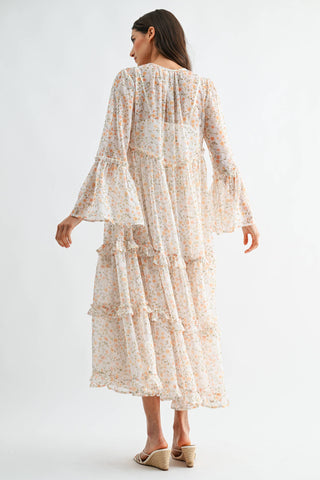 Woman wearing a floral dress on a white background