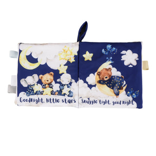 Children's soft book with teddy bears and stars on a blue background