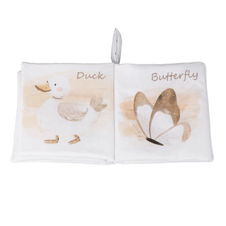 Open book with illustrations of a duck and a butterfly on each page.