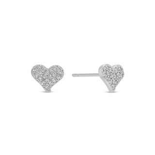 Heart-shaped earrings with diamond accents on a white background