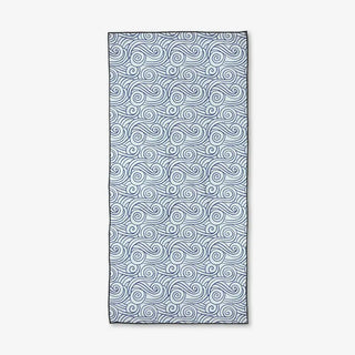 Rectangular towel with wavy pattern on a white background