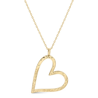 Gold heart-shaped pendant on a chain against a white background