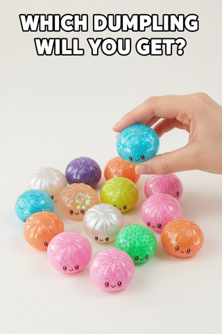Colorful dumpling-shaped toys with a hand picking one up on a white background.