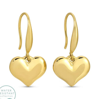 Gold heart-shaped earrings on a white background