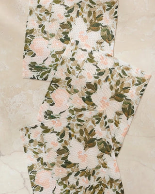 Floral-patterned fabric on a textured surface