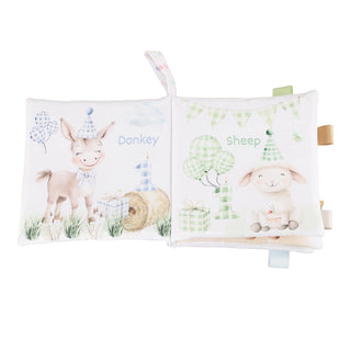 Two children's books with illustrations of a donkey and a sheep on a white background