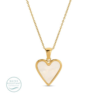 Heart-shaped pendant with gold frame and white center on a chain, water resistant label at the bottom.