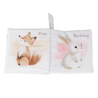 Children's book with fox and bunny illustrations on a white background