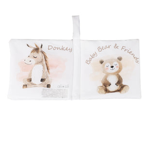 Children's book with illustrations of a donkey and a bear on a white background