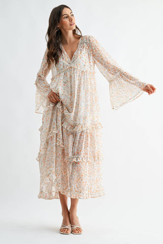 Woman wearing a floral dress on a white background