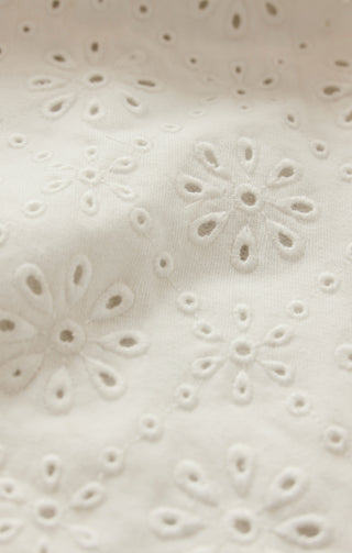 white eyelet fabric